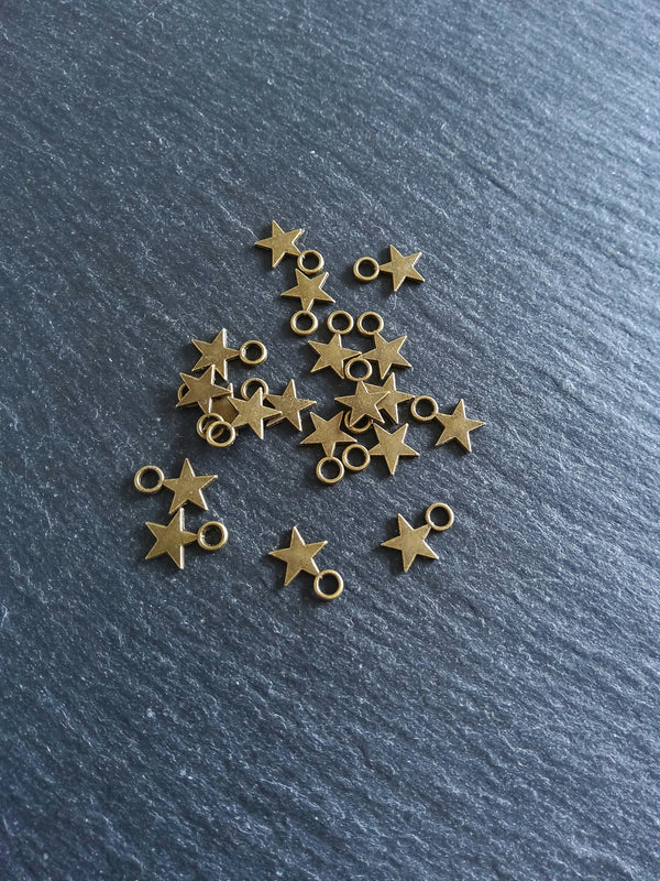 40 or 200 Small Star Charms Antique Bronze Tone 11x8mm