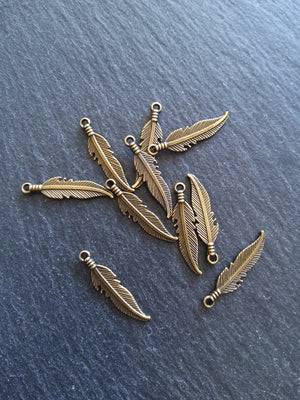 20 or 100 Antique Bronze Tone Feather Charms 27x6mm - ContentedCatz
