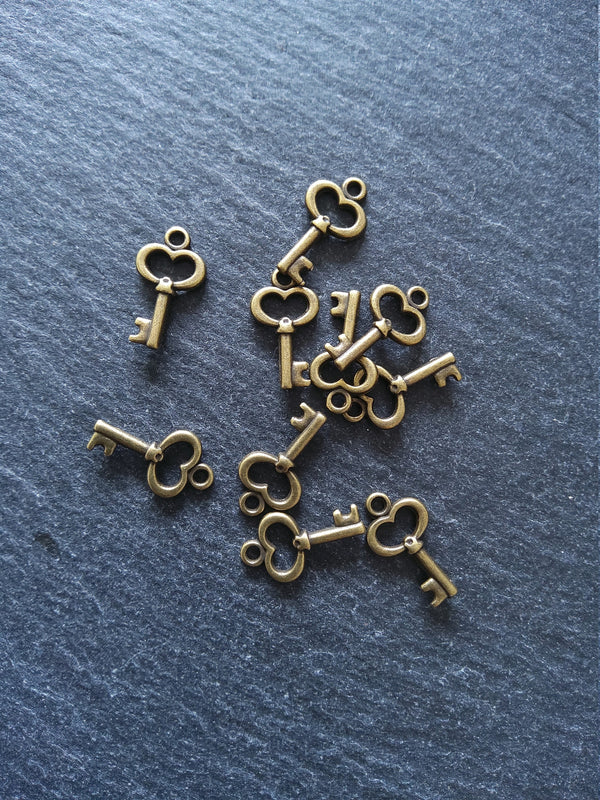 20 or 100 Cute Little Key Charms Antique Bronze Tone 15x9mm 2.5mm wide. Nickel FREE