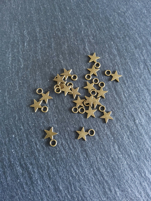 40 or 200 Small Star Charms Antique Bronze Tone 11x8mm