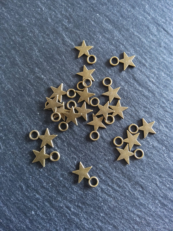 40 or 200 Small Star Charms Antique Bronze Tone 11x8mm