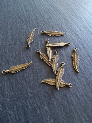 20 or 100 Antique Bronze Tone Feather Charms 27x6mm - ContentedCatz