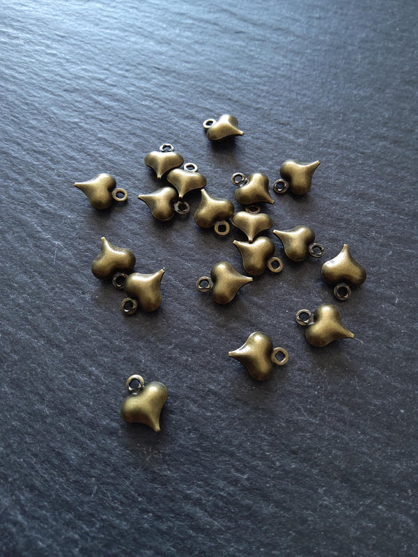20 or 100 Little Hollow Heart Charms Antique Bronze Tone Brass 10x8x3.3mm - ContentedCatz