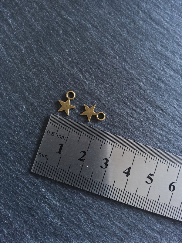 40 or 200 Small Star Charms Antique Bronze Tone 11x8mm