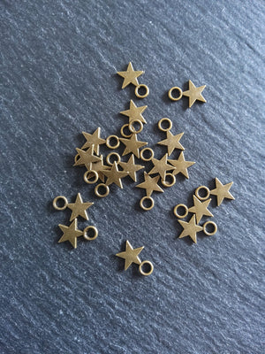 40 or 200 Small Star Charms Antique Bronze Tone 11x8mm