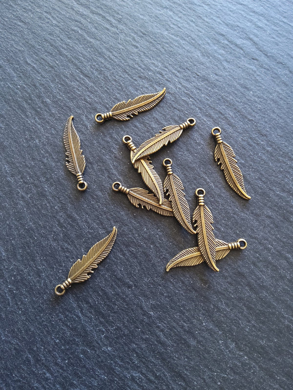 20 or 100 Antique Bronze Tone Feather Charms 27x6mm - ContentedCatz