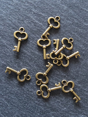 20 or 100 Cute Little Key Charms Antique Bronze Tone 15x9mm 2.5mm wide. Nickel FREE