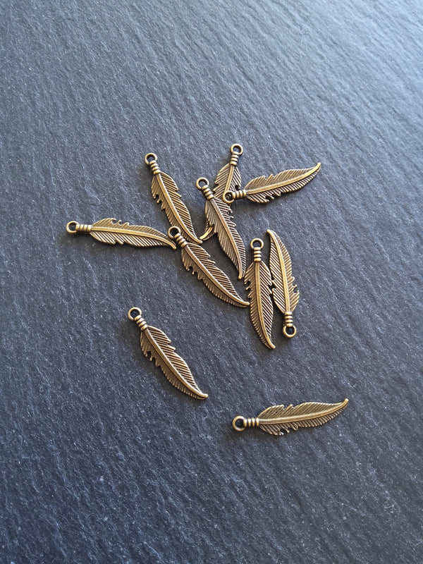 20 or 100 Antique Bronze Tone Feather Charms 27x6mm - ContentedCatz