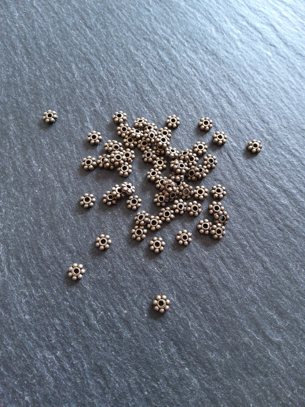 100 or 500 Antique Bronze Tone 4mm Daisy Spacer Beads 4x1.5mm - ContentedCatz