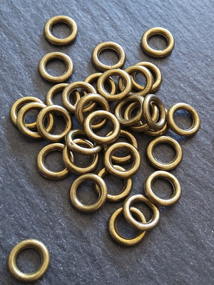 80 or 400 CLOSED 8mm Jump Rings Antique Bronze Tone Alloy 1.5mm (15 gauge)