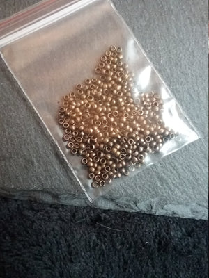 Approx. 500 (7g) pack of 2mm Crimp Beads in Gold or Silver Plated, Antique Silver Tone, Antique Bronze or Antique Copper Tone Hole: 1.2mm