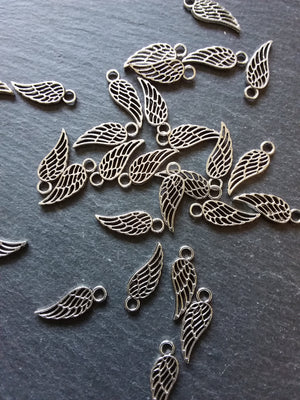 20 or 100 Small Bird or Angel Wing Charms Silver Tone 18x7mm