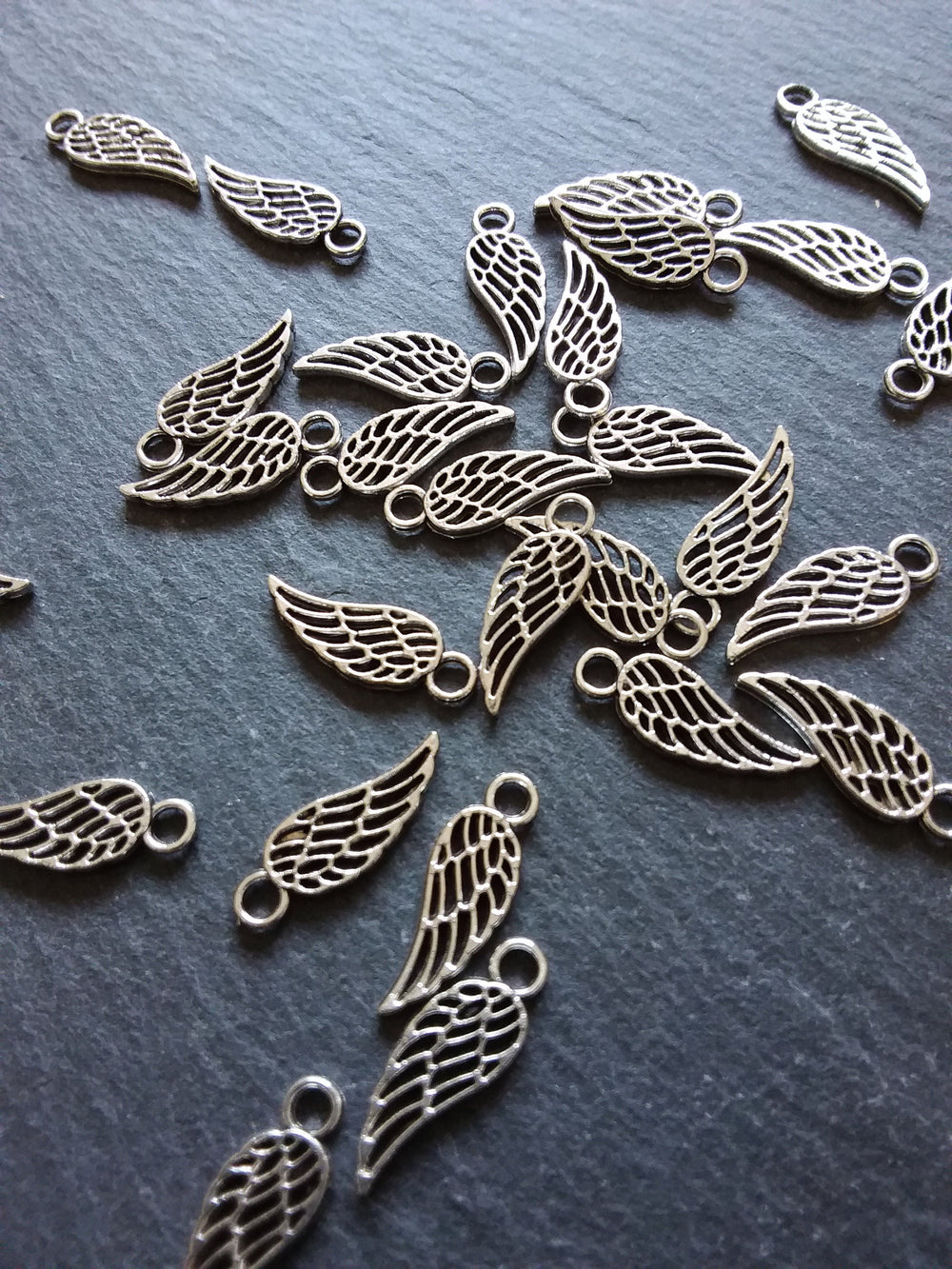 20 or 100 Small Bird or Angel Wing Charms Silver Tone 18x7mm