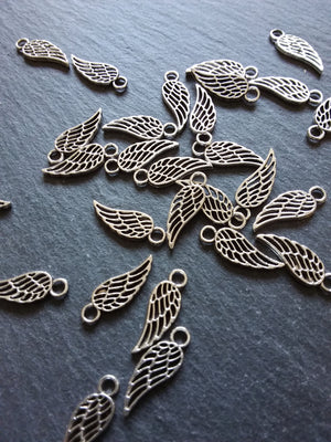 20 or 100 Small Bird or Angel Wing Charms Silver Tone 18x7mm