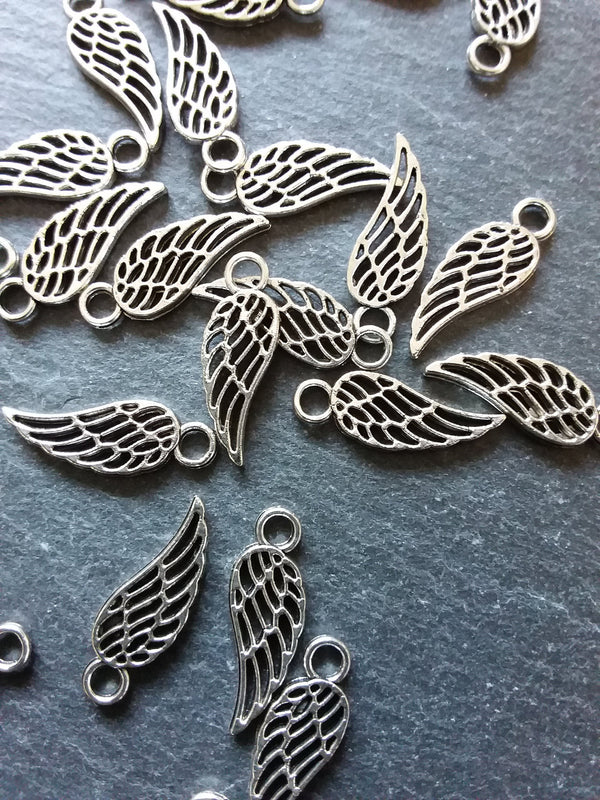 20 or 100 Small Bird or Angel Wing Charms Silver Tone 18x7mm