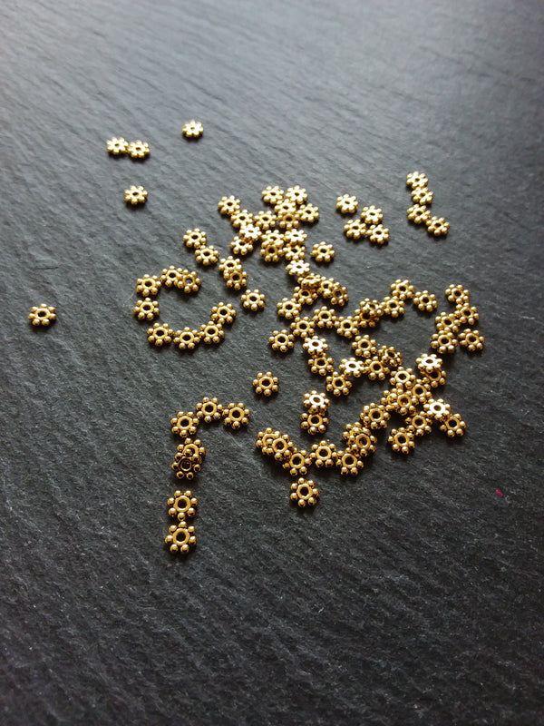 100 or 500 Gold Plated 4mm Daisy Spacer Beads 4x1.2mm