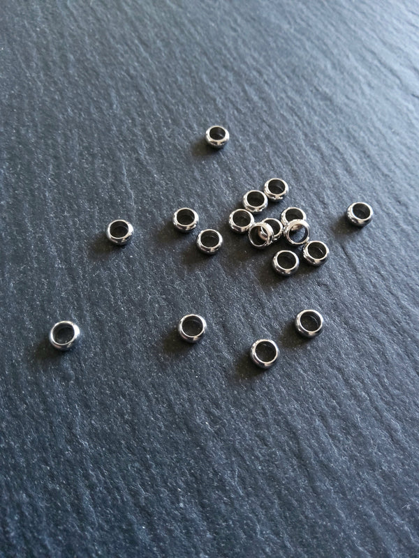 10 or 50 Stainless Steel 5mm Solid Round Closed Ring Spacer Beads 5x2mm. Hole: 3.2mm