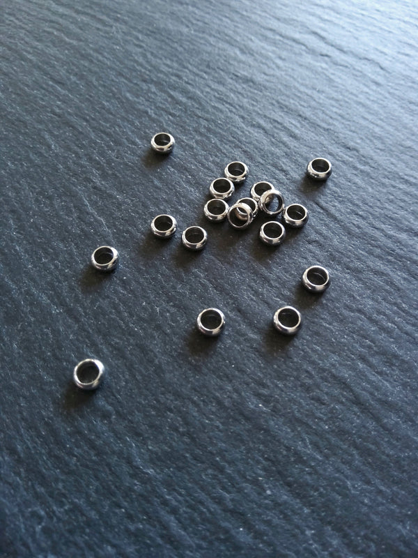 10 or 50 Stainless Steel 5mm Solid Round Closed Ring Spacer Beads 5x2mm. Hole: 3.2mm
