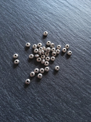 100 or 500 Wheel Spacer Beads 5mm Diameter Antique Silver Tone Alloy 5x3mm Hole: 1.1mm