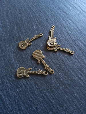 10 or 50 Guitar Charms Antique Bronze Tone 31x11x2mm