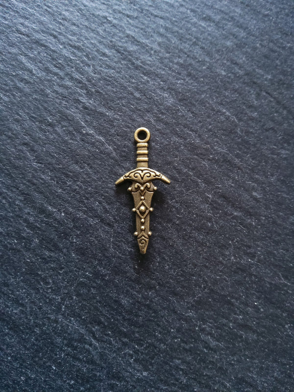 10 or 50 Sword Charms Antique Bronze Tone Metal Alloy 28x13mm