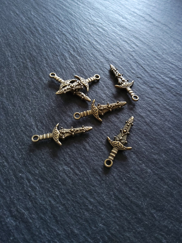 10 or 50 Sword Charms Antique Bronze Tone Metal Alloy 28x13mm