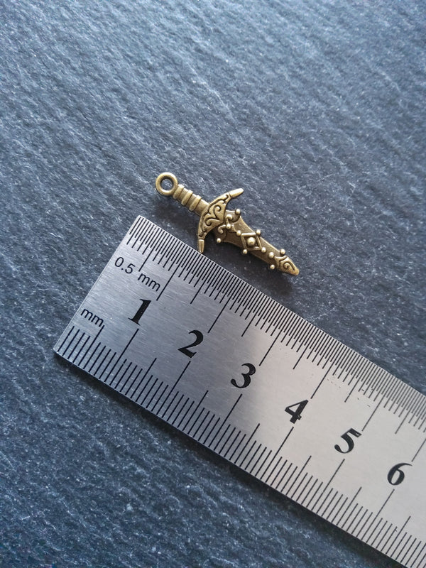 10 or 50 Sword Charms Antique Bronze Tone Metal Alloy 28x13mm
