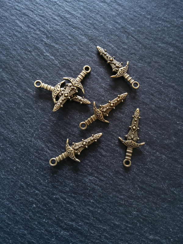 10 or 50 Sword Charms Antique Bronze Tone Metal Alloy 28x13mm