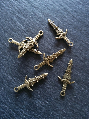 10 or 50 Sword Charms Antique Bronze Tone Metal Alloy 28x13mm