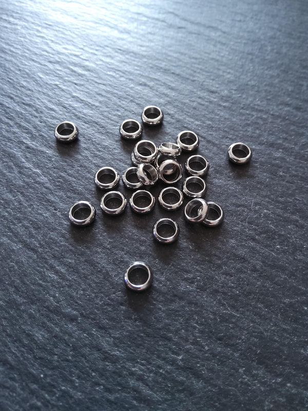 10 or 50 Stainless Steel 6mm Solid Round CLOSED Ring Spacer Beads 6x2mm. Hole: 4mm Non-Tarnish