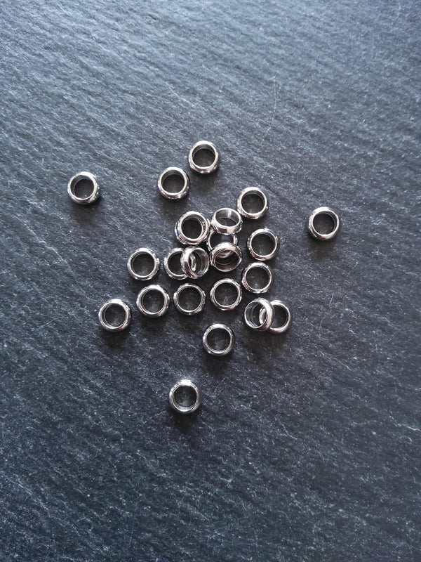 10 or 50 Stainless Steel 6mm Solid Round CLOSED Ring Spacer Beads 6x2mm. Hole: 4mm Non-Tarnish