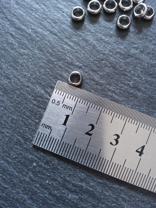 10 or 50 Stainless Steel 6mm Solid Round CLOSED Ring Spacer Beads 6x2mm. Hole: 4mm Non-Tarnish