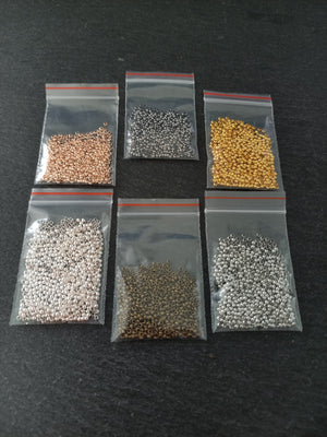 Approx. 500 (7g) pack of 2mm Crimp Beads in Bright Gold, Rose Gold or Silver, Antique Silver, Bronze or Gunmetal Hole: 1.2mm