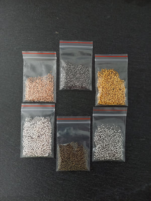 Approx. 500 (7g) pack of 2mm Crimp Beads in Bright Gold, Rose Gold or Silver, Antique Silver, Bronze or Gunmetal Hole: 1.2mm