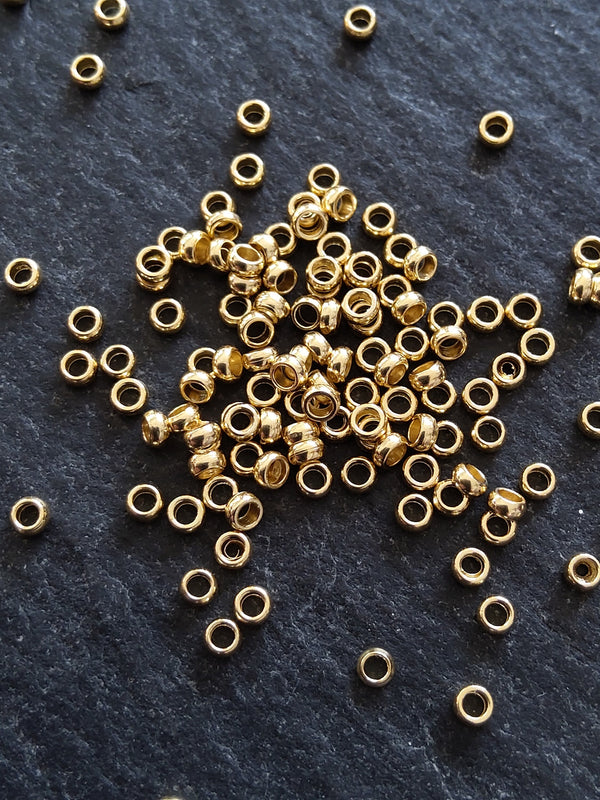 60 or 300 Crimp Beads Genuine 24K Gold Plated 316 Surgical Steel 1.9mm Hole: 1mm - ContentedCatz