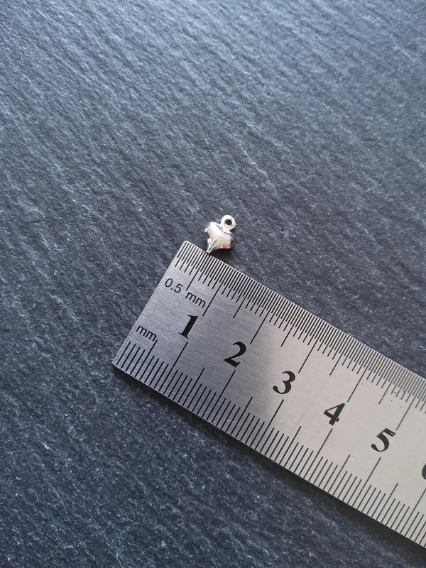 20 or 100 Tiny Hollow Heart Charms Silver Tone Alloy 9x6mm - ContentedCatz