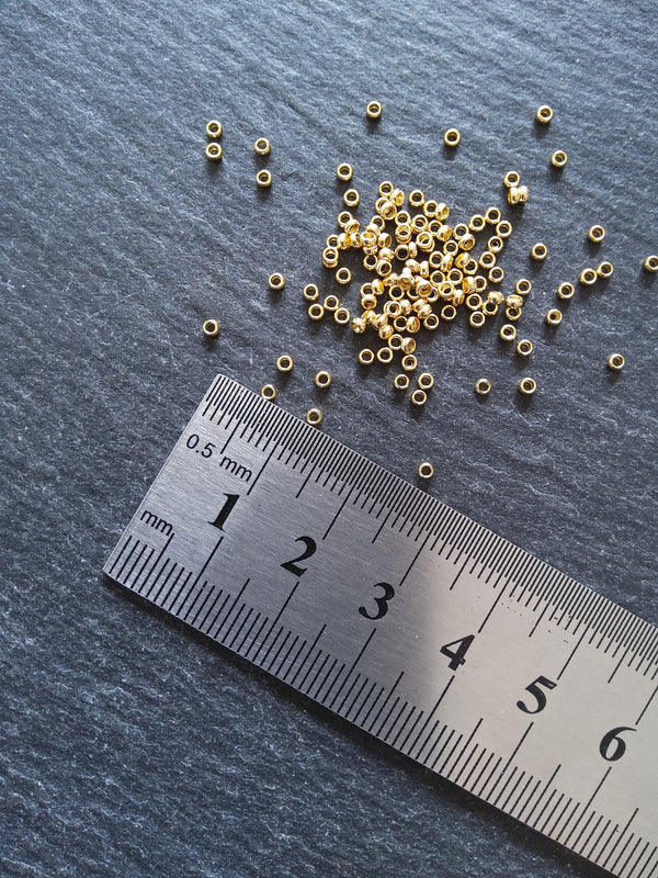 60 or 300 Crimp Beads Genuine 24K Gold Plated 316 Surgical Steel 1.9mm Hole: 1mm - ContentedCatz