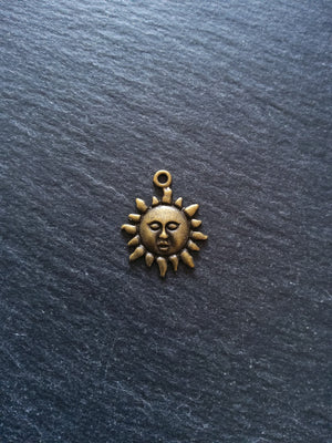 10 or 50 Sun Face Charms Antique Bronze Tone 23x19mm