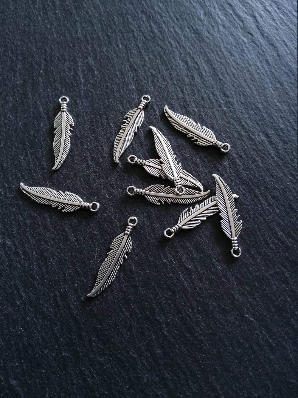 10 or 50 Antique Silver Tone Feather Charms 27x7mm - ContentedCatz
