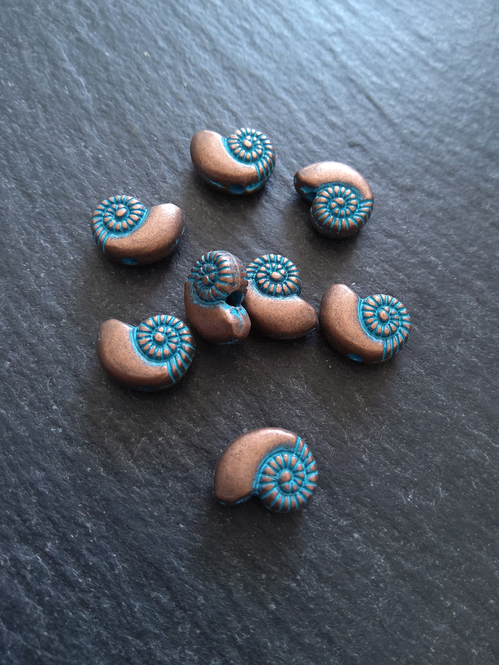 10 or 50 Sea Shell Snail Ammonite Beads 8mm Antique Copper with Blue Patina 11x8x4mm