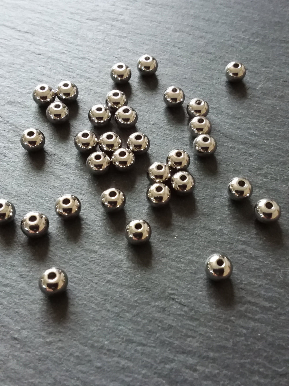 10 or 50 Stainless Steel 6mm Solid Round Spacer Beads 1mm Hole