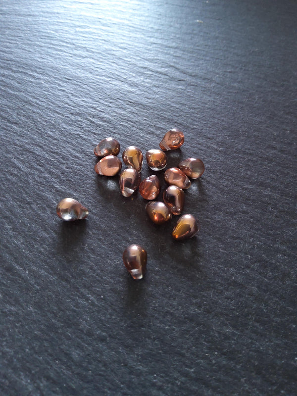 25 Czech Glass Teardrop Beads 5.5x8.5mm Clear Copper with Metallic Copper Lustre. Hole: 0.8mm