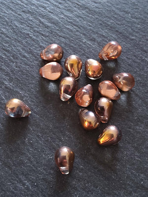 25 Czech Glass Teardrop Beads 5.5x8.5mm Clear Copper with Metallic Copper Lustre. Hole: 0.8mm