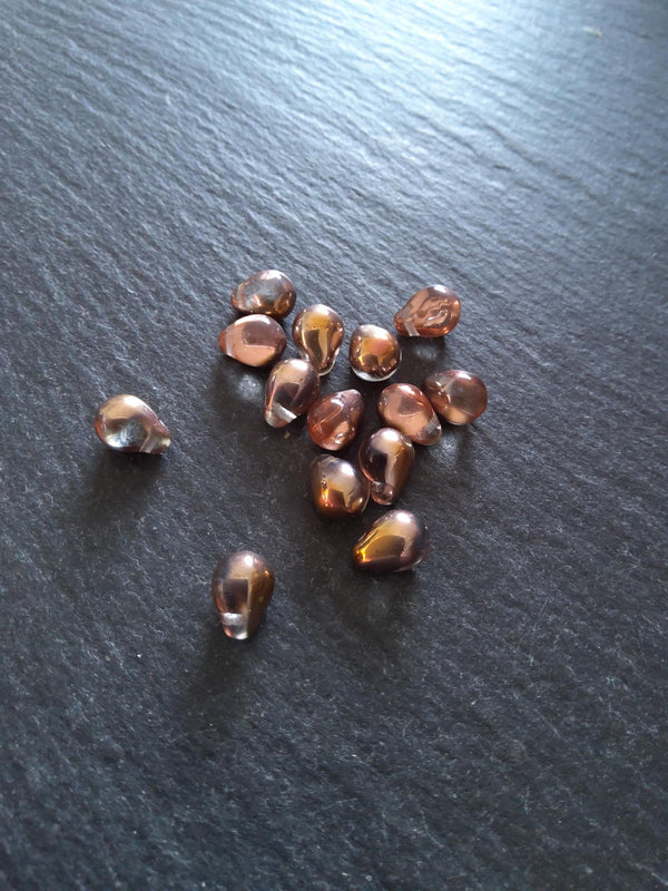 25 Czech Glass Teardrop Beads 5.5x8.5mm Clear Copper with Metallic Copper Lustre. Hole: 0.8mm