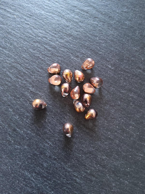 25 Czech Glass Teardrop Beads 5.5x8.5mm Clear Copper with Metallic Copper Lustre. Hole: 0.8mm