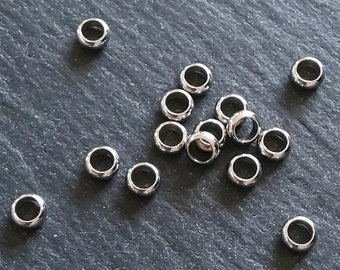 10 or 50 Stainless Steel 5mm Solid Round Closed Ring Spacer Beads 5x2mm. Hole: 3.2mm