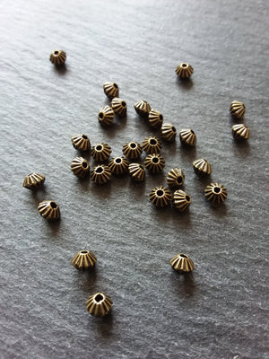 40 or 200 Bicone 5mm Antique Bronze Tone Striped Spacer Beads 5x4mm. Hole: 1mm - ContentedCatz