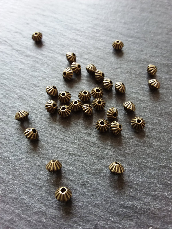 40 or 200 Bicone 5mm Antique Bronze Tone Striped Spacer Beads 5x4mm. Hole: 1mm - ContentedCatz