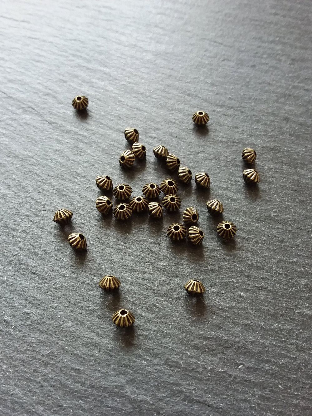 40 or 200 Bicone 5mm Antique Bronze Tone Striped Spacer Beads 5x4mm. Hole: 1mm - ContentedCatz
