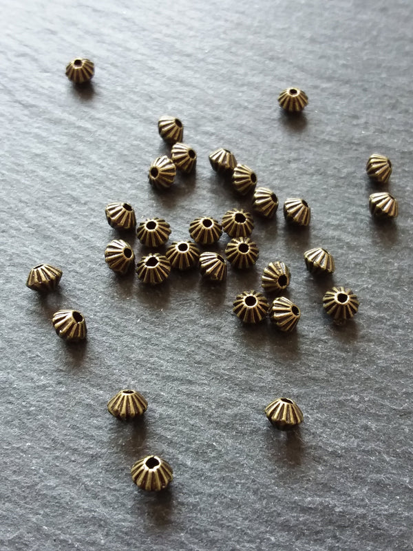 40 or 200 Bicone 5mm Antique Bronze Tone Striped Spacer Beads 5x4mm. Hole: 1mm - ContentedCatz